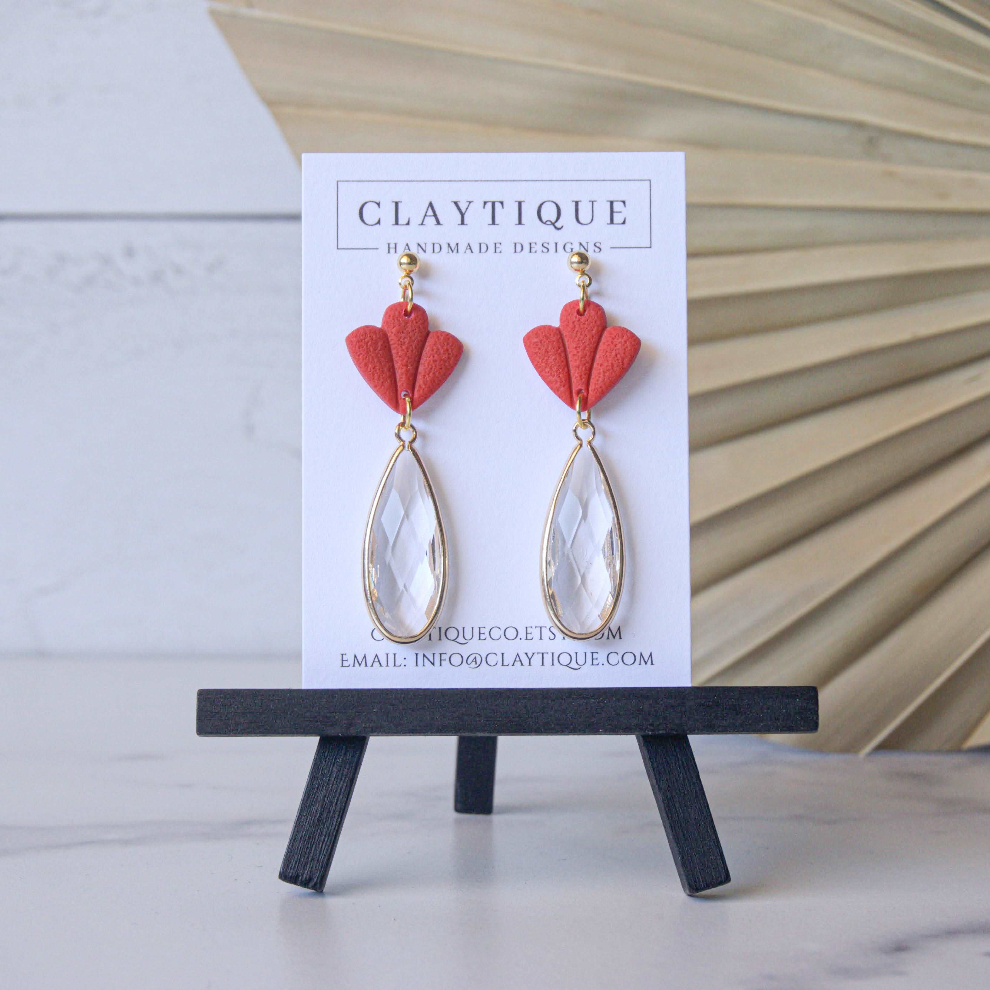 Red Dangle earrings handmade with polymer clay and crystal glass pendants.