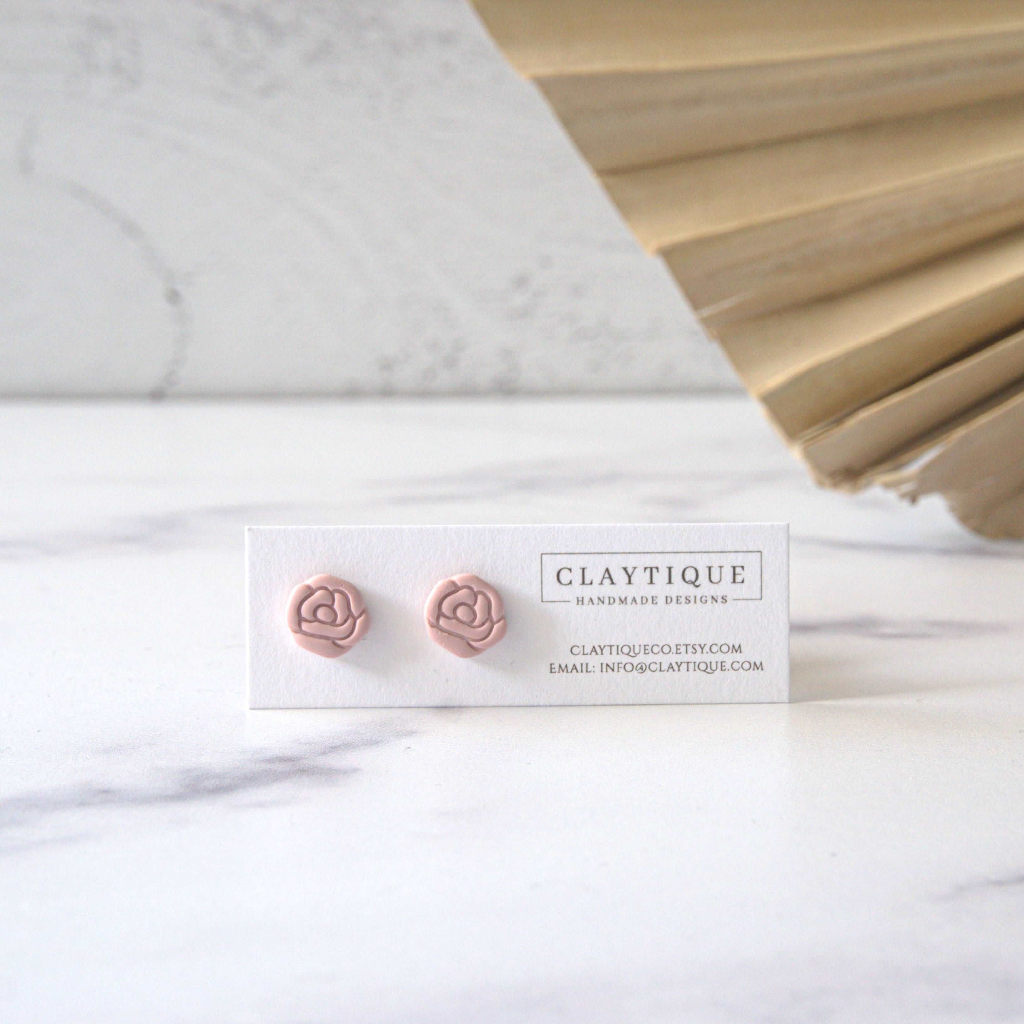 Valentine's rose stud made with handmade polymer clay and an 18K Gold plated stainless steel Hypoallergenic, nickel and lead-free post. 